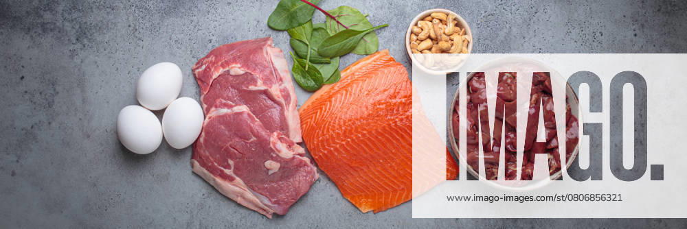 Food ingredients high in iron for health and wellness top view on grey concrete background Food ingredients high in iron for health and wellness top view on grey concrete background