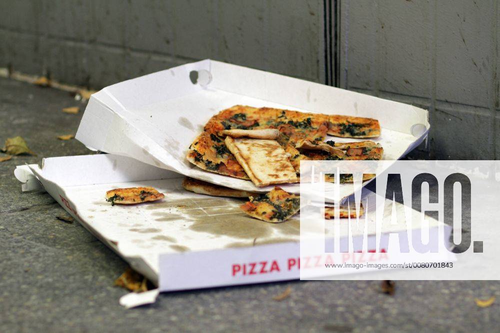 To-eat Pizza is on the Bottom a is with behind on the Bottom