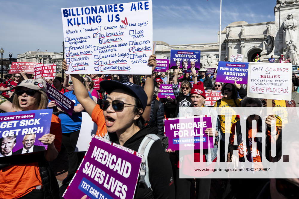 People with signs at a rally to save healthcare in Washington, D.C. Washington USA - ZUMAb161 20250312_aap_b161_027