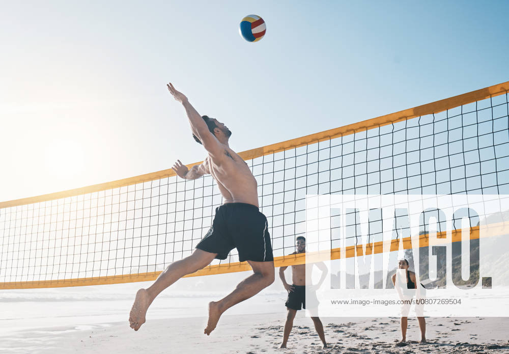 Man, jump and volleyball in air on beach by net in sports match, game or competition. Body of male person jumping for ball in volley or spike in healthy fitness, energy or exercise by the ocean coast., model released, , 53695492.jpg, man, jump, volleyball, air, beach, fitness, body, male, sports, person, sport, healthy, health, fit, exercise, jumping, ball, game, ocean, energy, coast, net, competition, match, volley, spike, young, people, adult, youth, team, summer, water, fun, outdoor, life, playing, together, guy, training, sea, teamwork, workout, moving, wellness, active, sunshine, play, sand, athlete RECORD DATE NOT STATED