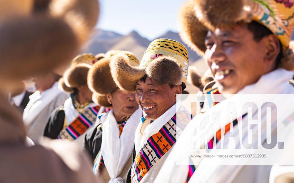 (250317) -- BEIJING, March 17, 2025 -- Farmers participate in a ceremony marking the start of spring farming in Codoi Township of Lhunzhub County, southwest China s Xizang Autonomous Region, March 16, 2025. Ceremonies marking the start of spring farming were held across Xizang on Sunday. The ceremony is of great significance as it marks the beginning of a new year s farming season and serves as a prayer for favorable weather and bountiful harvests. ) XINHUA PHOTOS OF THE DAY TenzinxNyida