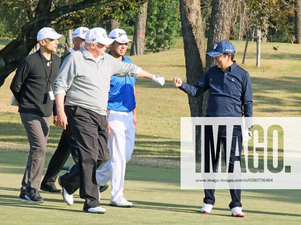 Trump in Japan Japanese Prime Minister Shinzo Abe (R) and U.S. President Donald Trump fist-bump before professional golfer Hideki Matsuyama (C) at Kasumigaseki Country Club in Kawagoe, Saitama Prefecture, on Nov. 5, 2017. Abe and Trump played the sport a day before their formal talks in Tokyo. (Photo courtesy of the Cabinet Public Relations Office)