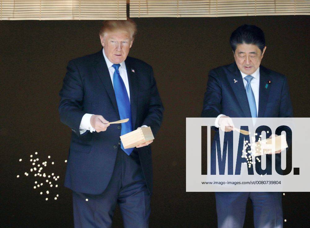 Trump in Japan Japanese Prime Minister Shinzo Abe (R) and U.S. President Donald Trump feed carp in a pond at the Akasaka Palace state guesthouse in Tokyo on Nov. 6, 2017. Trump was in Japan for a three-day visit, part of his first trip to Asia since his inauguration. (Pool photo)