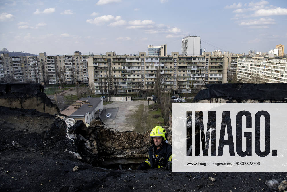 The Aftermath Of A Russian Shahed Attack Drone Strike On A Residential High-rise In Kyiv Rescuers work at the impact site of a Russian Shahed attack drone strike on a residential high-rise in Kyiv, Ukraine, on March 23, 2025. As a result of the attack, three people die in Kyiv, including a 5-year-old child. Kyiv Ukraine
