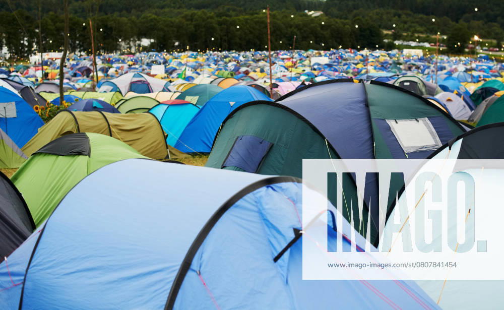 Tent, field and outdoor for festival or camping in nature, summer or forest for adventure or vacation. Event, campsite or setup for sleeping, rest or shelter in woods, trees or environment background. , 56597502.jpg, tent, field, outdoor, festival, background, summer, nature, forest, sleeping, vacation, tree, camping, wood, trees, event, adventure, environment, camp, rest, woods, ground, shelter, setup, campsite, natural, outside, fun, view, outdoors, travel, music, park, day, grass, holiday, freedom, relax, carefree, getaway, concert, celebration, recreation, earth, leisure, community, bush, many, calm, gathering, sustainable RECORD DATE NOT STATED