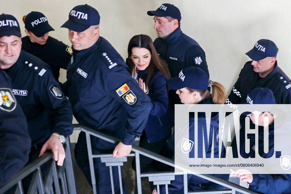 MOLDOVA, CHISINAU - APRIL 1, 2025: Police escort Gagauzia Governor Evghenia Gutul inside a court building. Gutul, who was detained at Chisinau International Airport on 25 March 2025, is facing criminal charges over alleged financial misconduct related to the 2023 elections in Gagauzia. Vadim Denisov TASS 79524699