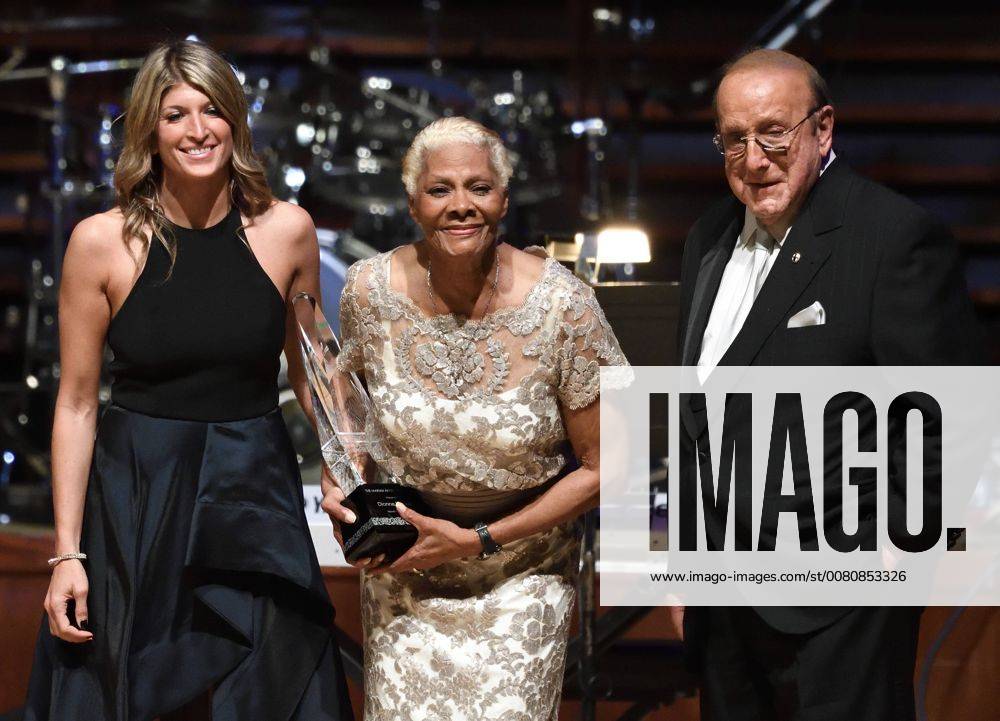 Philadelphia, Pennsylvania, U.S - Board Chair, NINA C TINARI SCHULSON, and CLIVE DAVIS, presents DIONNE WARWICK, with the 2017 Marian Anderson Award at the Marian Anderson Award Gala held at the Kimmel Center in Philadelphia PA The Marian Anderson Award was created to honor and celebrate world-renowned artists for their artistic work and talents, as well as their philanthropic contributions to society. It is named in memory of culture-changing vocalist and distinguished Philadelphian, Marian Anderson. Philadelphia U.S. - ZUMArf1_ 20171114_zaf_rf1_020