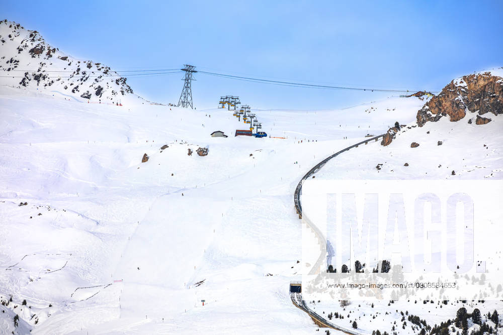 Town of Sankt Moritz luxury winter ski slope and cogwheel track view, Graubunden region of Switzerland , 57568678.jpg, sankt, st, moritz, peak, ski, area, region, switzerland, alps, swiss, mountain, snow, skiing, winter, leisure, holiday, resort, vacation, landscape, high, nature, top, europe, trip, transport, scenic, landmark, travel, european, schweiz, tourist, destination, alpine, panorama, panoramic, idyllic, village, street, church, grisons, graubunden, elite, slope, cogwheel, rail, railway, Chantarella, Corviglia RECORD DATE NOT STATED