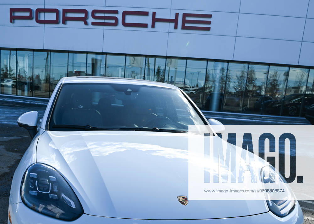 Trumps 25% Tariff On Imported Vehicles And Auto Parts To Impact Jobs And Economy EDMONTON, CANADA APRIL 2: A file picture of a Porsche vehicle parked outside a Porsche dealership in Edmonton, Alberta, Canada, on April 2, 2025. U.S. President Donald Trump s administration announced a 25% tax on fully-built vehicles and essential auto parts, including engines and transmissions, which will go into effect on April 3. Edmonton Canada