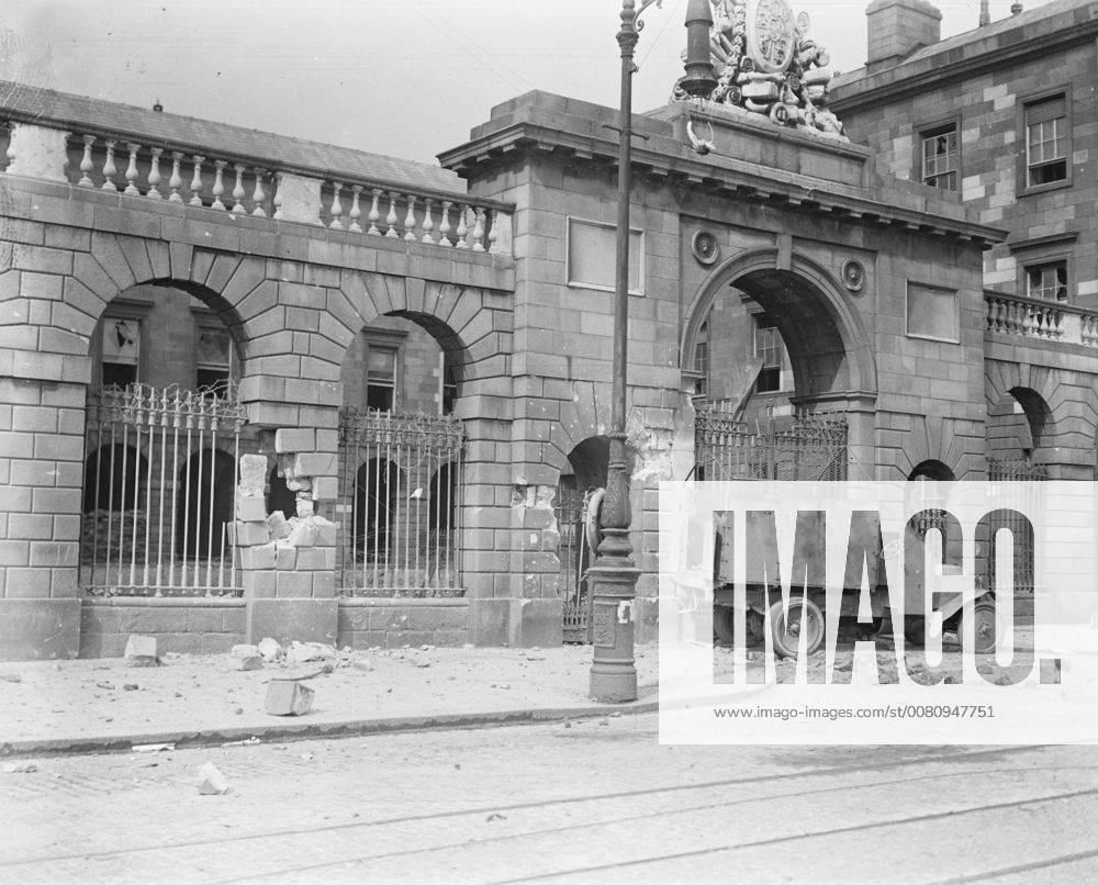 The Great Battle of Dublin . The capture of the Four Courts in Dublin . The riverfront of the Four Courts showing an armoured car used in the attack by the Irish Free State troops during the fire rush of the storming party . 1 July 1922, Ireland