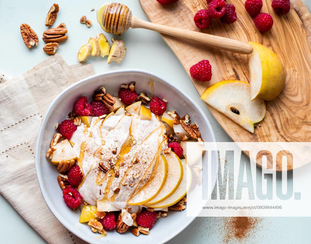 Beautiful Fruit and Yogurt Bowl with Raspberries and Pears Salt Lake City, Utah, United States CR_XSQD250405-1589334-01
