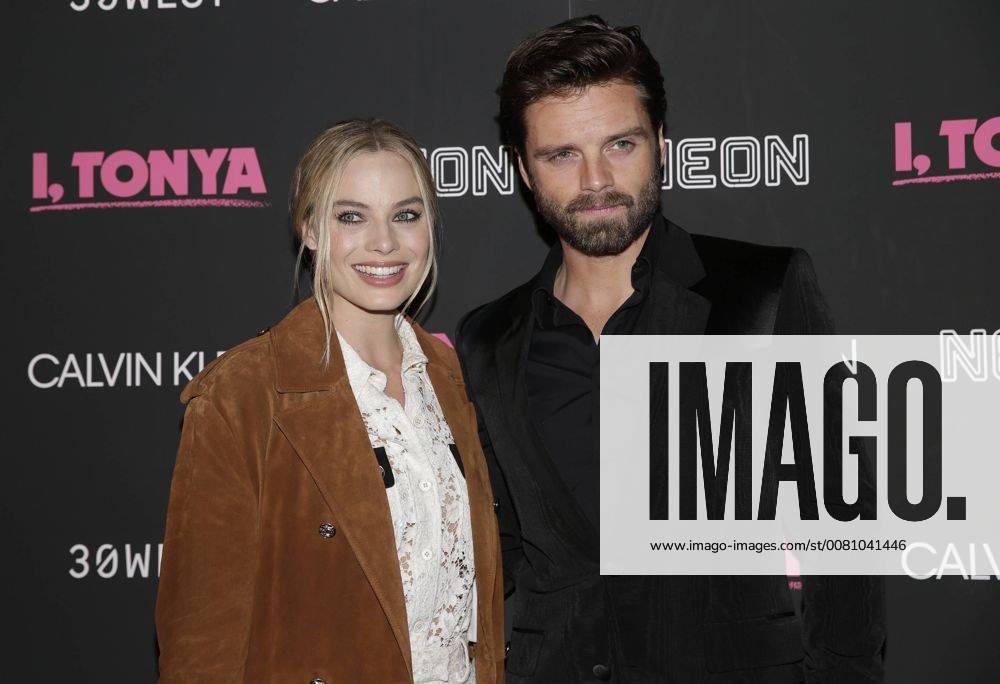 Margot Robbie and Sebastian Stan arrive on the red carpet at the I, Tonya New York Premiere at Village East Cinema on November 28, 2017 in New York City. NYP20171128108 JOHNxANGELILLO