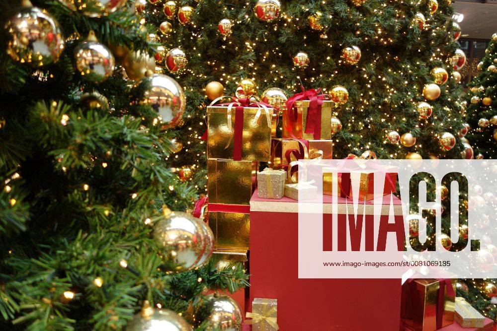 Decorated Christmas tree with gifts in a shopping center in Berlin on 01.12.2017. Symbol Christmas Ina Peek