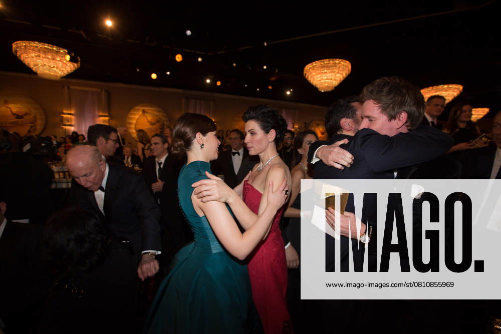 72nd Annual Golden Globe Awards Felicity Jones, Julianna Margulies and Eddie Redmayne at the 72nd Annual Golden Globe Awards at the Beverly Hilton in Beverly Hills, CA on Sunday, January 11, 2015. Beverly Hills CA United States