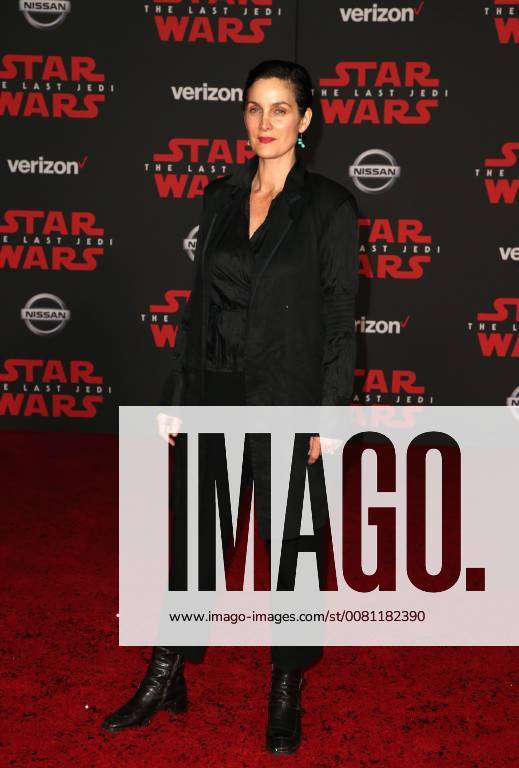 LOS ANGELES, CA - DECEMBER 9: Carrie-Anne Moss, at Premiere Of Disney Pictures And Lucasfilm s Star Wars: The Last Jedi at Shrine Auditorium in Los Angeles, California on December 9, 2017.
