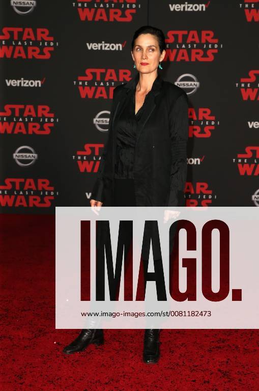 LOS ANGELES, CA - DECEMBER 9: Carrie-Anne Moss, at Premiere Of Disney Pictures And Lucasfilm s Star Wars: The Last Jedi at Shrine Auditorium in Los Angeles, California on December 9, 2017.