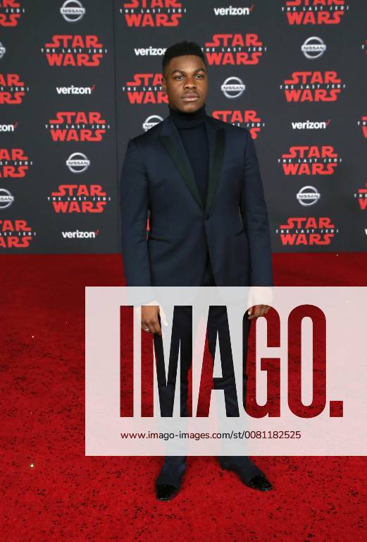 LOS ANGELES, CA - DECEMBER 9: John Boyega, at Premiere Of Disney Pictures And Lucasfilm s Star Wars: The Last Jedi at Shrine Auditorium in Los Angeles, California on December 9, 2017.