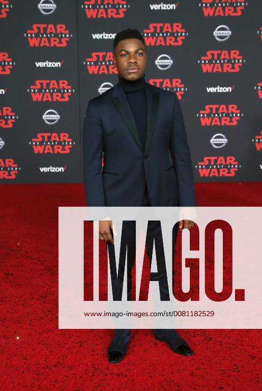 LOS ANGELES, CA - DECEMBER 9: John Boyega, at Premiere Of Disney Pictures And Lucasfilm s Star Wars: The Last Jedi at Shrine Auditorium in Los Angeles, California on December 9, 2017.