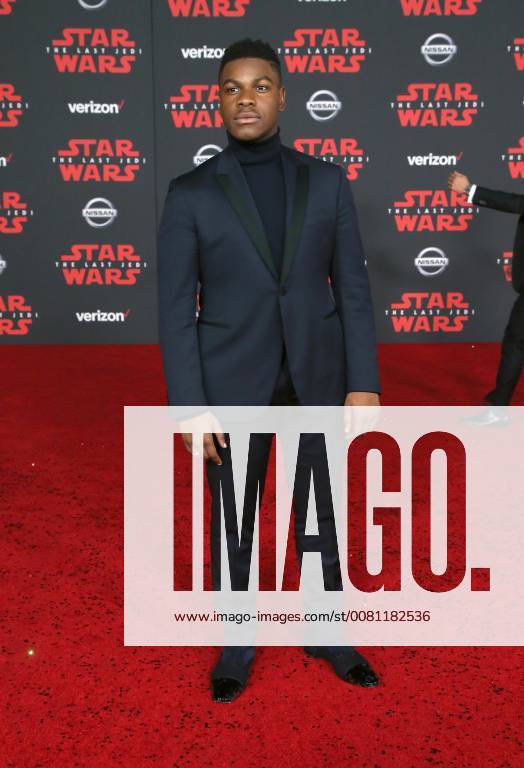 LOS ANGELES, CA - DECEMBER 9: John Boyega, at Premiere Of Disney Pictures And Lucasfilm s Star Wars: The Last Jedi at Shrine Auditorium in Los Angeles, California on December 9, 2017.