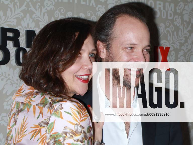NEW YORK, NY - DECEMBER 12: Maggie Gyllenhaal, Peter Sarsgaard, at the Netflix premiere of Wormwood at The Campbell in New York City on December 12, 2017.