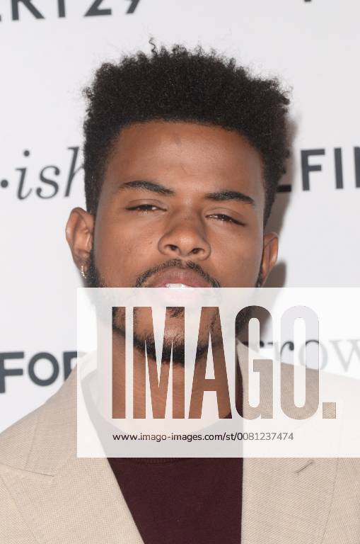 HOLLYWOOD, CA - DECEMBER 13: Trevor Jackson at the Grown-ish Premiere at Lure Nightclub in Hollywood, California on December 13, 2017.