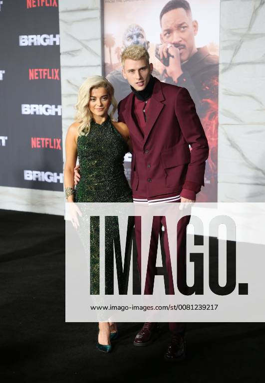 WESTWOOD, CA - DECEMBER 13: Bebe Rexha, Machine Gun Kelly, at Premiere Of Netflix s Bright at The Regency Village Theatre, In Hollywood, California on December 13, 2017.