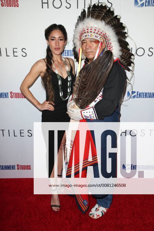BEVERLY HILLS, CA - DECEMBER 14: Q orianka Kilcher and Wes Studi at the Los Angeles Premiere of Hostiles at the Samuel Goldwyn Theater in Beverly Hills, California on December 14, 2017.