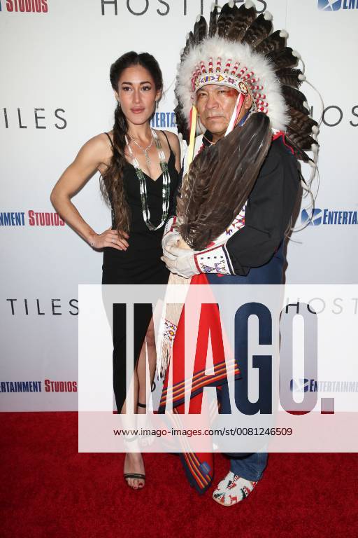 BEVERLY HILLS, CA - DECEMBER 14: Q orianka Kilcher and Wes Studi at the Los Angeles Premiere of Hostiles at the Samuel Goldwyn Theater in Beverly Hills, California on December 14, 2017.