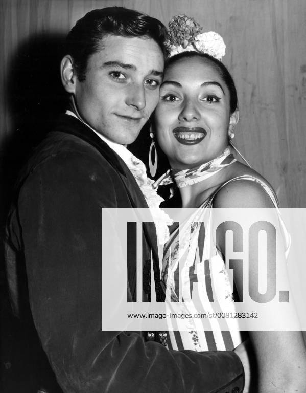 Antonio Gades and Nana Lorca, 2 of the principal Spanish dancers in the Ballet Espanol of Pilar Lopez, celebrate their engagement at the Princes Theatre, London. 11 May 1959, London United Kingdom England