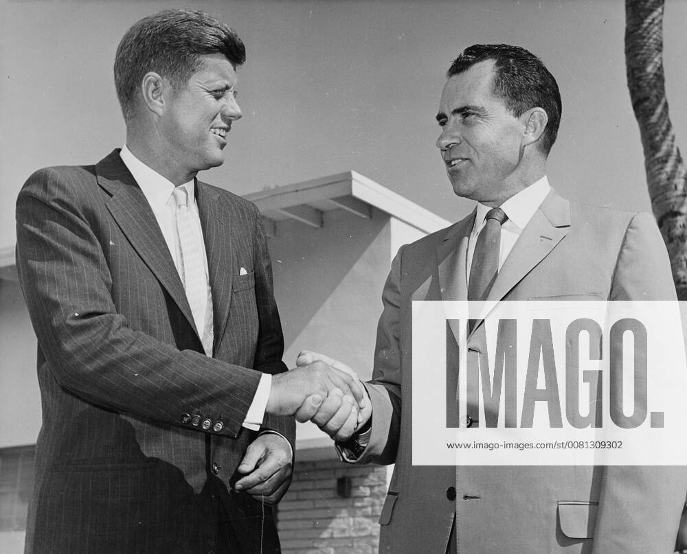 Friendly Rivals. President-Elect John F. Kennedy (left) shakes hands with Richard Nixon, his Republican opponent in the Presidential election here on November 14th. The who men chatted for over an hour, but Kennedy did not, in spite of predictions to the contrary, offer Nixon a big job in his administration. He still has responsibilities as the leader of his party, said Kennedy. Florida, USA. 16 November 1960., Key Biscayne Florida USA