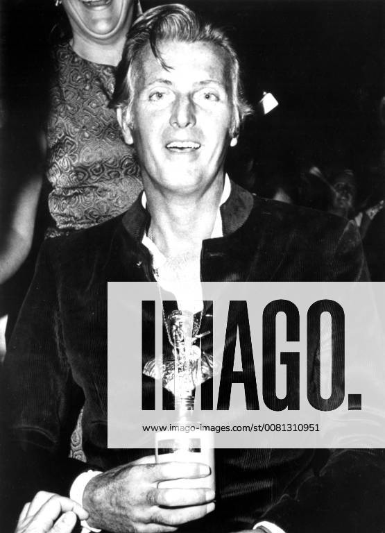 French designer Hubert de Givenchy pictured , after he had been presented with the Golden Tiberius award as the best deisgner at the Maremoda Sea Fashion Show on the Isle of Capri , 12 September . Many famous stars and members of the European jet set attended the show . 14 September 1969, Italy