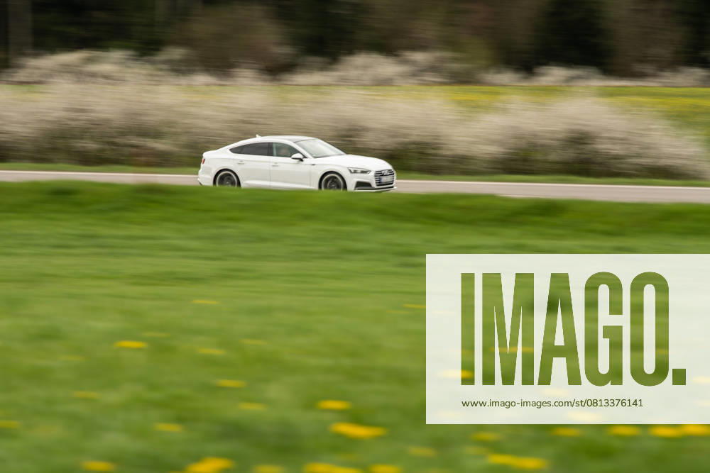 A car drives on the federal highway 27 B27 near Rottweil Shot with longer exposure time Rottweil Baden Württemberg Germany