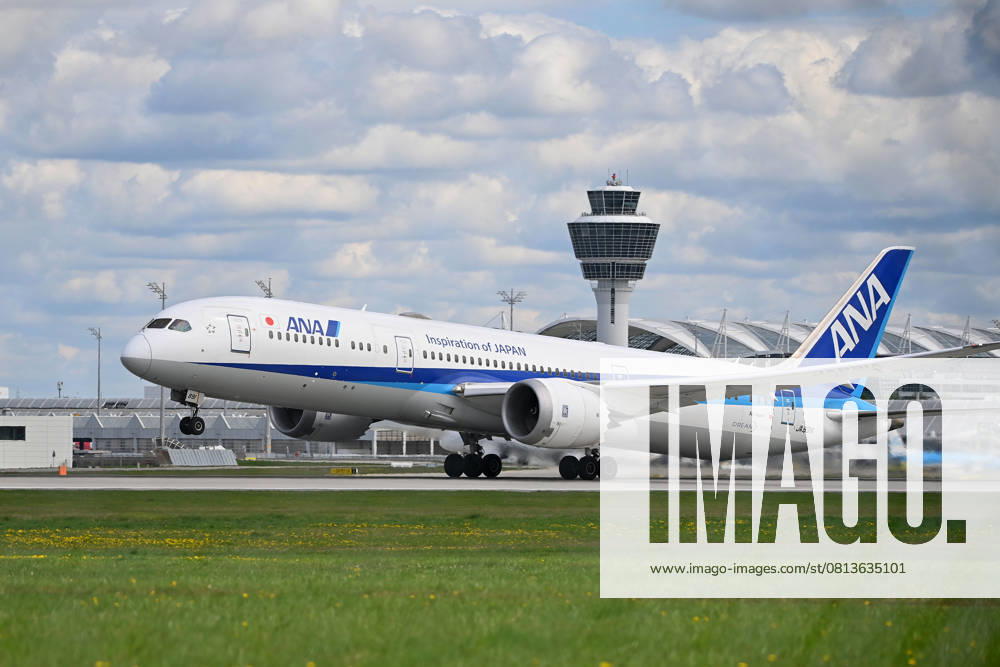 ANA All Nippon Airways JA89IA B787 Dreamliner takes off, takeoff in front of tower and terminal passenger jets at Franz Josef Strauss Airport in Munich Munich