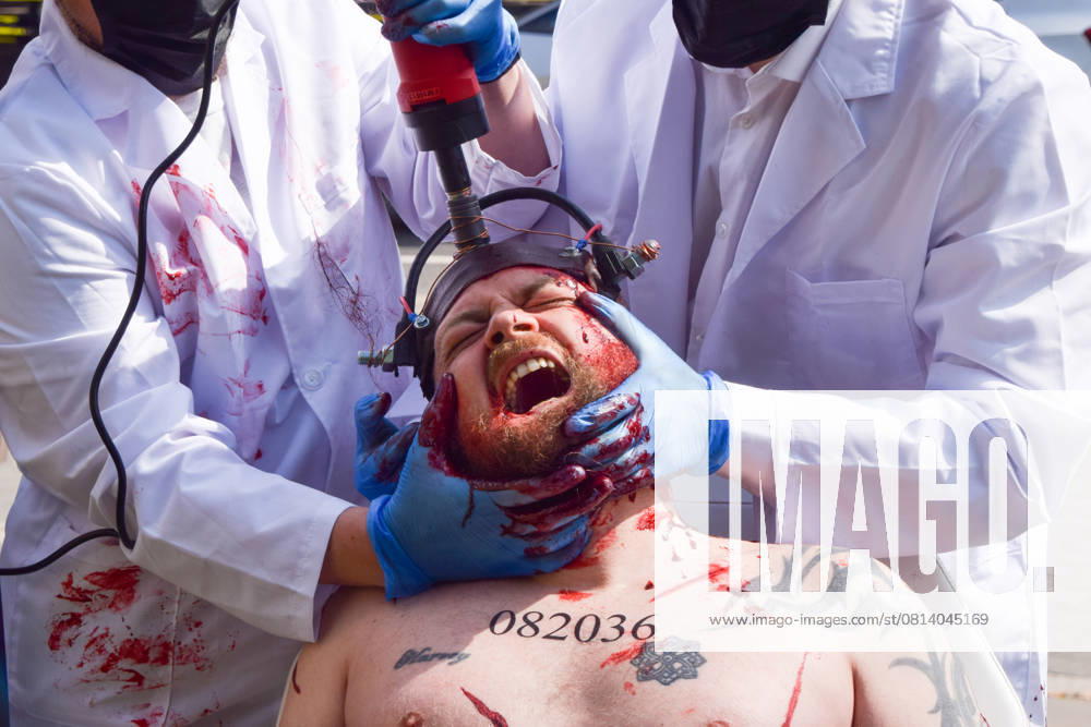 PETA activists stage a gruesome protest depicting animal testing procedures outside the parliament, calling on the government to phase out all animal experiments. The action marks the World Day for Animals in Laboratories. London United Kingdom - ZUMAv130 20250424_zip_v130_010
