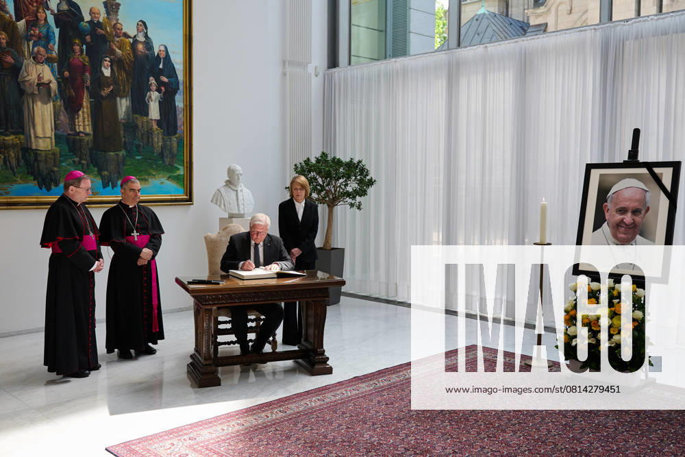 German President Frank Walter Steinmeier writes on Friday 25 April 2025 in the book of condolence for the late Pope Francis alongside Bishop Georg Baetzing Bätzing,1 v l , the Apostolic Nuncio, Archbishop Nikola EteroviÄ‡ 2 v l , and his wife, Elke Buedenbender Büdenbender , at the Apost
