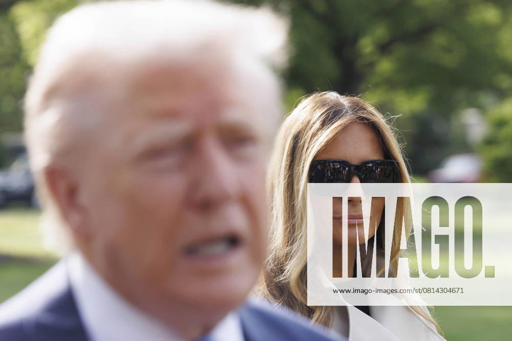 First lady Melania Trump looks on as US President Donald J. Trump gives remarks on the South Lawn of the White House in Washington DC on April 25, 2025. President Trump is departing for Italy to attend the funeral of Pope Francis Washington USA - ZUMAs152 20250425_faa_s152_013