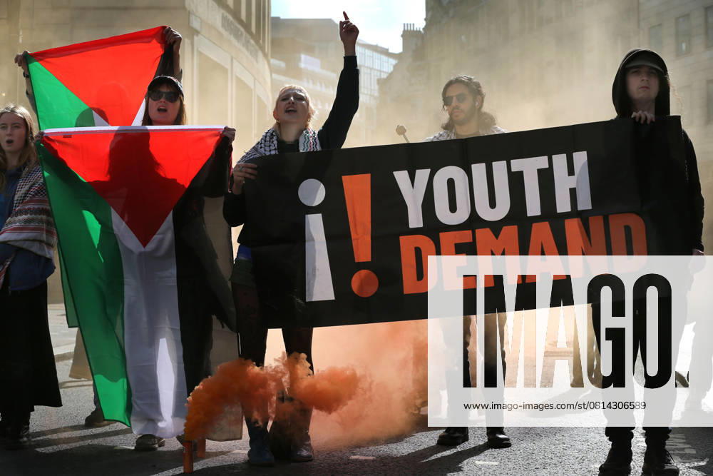 Activists use banners and coloured smoke flares to occupy Gracechurch Street and prevent the free flow of traffic. Protesters from Youth Demand block the traffic on their penultimate day of their April 2025 month of protest . Activists continue their road Ã¢â‚¬ËœswarmingÃ¢â‚¬â ¢ in an attempt to bring London to a standstill. They block roads in central London to highlight the plight of the Palestinian people in Gaza and the West Bank and the complicity as they see it of the UK government in continuing to export UK built weapons to Israel and the use of RAF recognisance flights over Gaza. They demand the UK government impose a full arms and trade embargo on Israel and immediately halt the development of - ZUMAmp3_ 20250425_zip_mp3_014