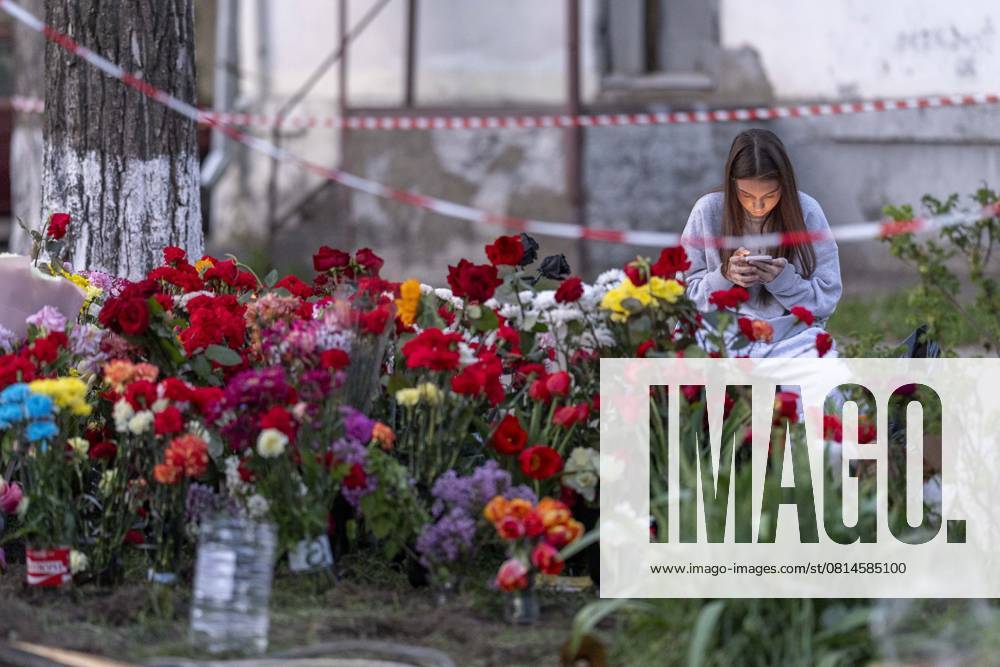 People mourn the loved ones they lost with flowers, candles and plush toys at site of destruction two days after a Russian missile strike on Ukraines capital Kyiv on April 24 2025. Twelve people have been killed and many more injured. Kyiv Kyiv City Ukraine