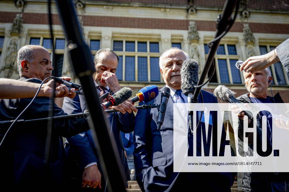 KW18 THE HAGUE - Riyad Mansour and Ammar Hijazi of the Palestinian Authority addresses the press after the first day of hearings at the International Court of Justice. The Peace Palace is hearing the case on Israel s humanitarian obligations against Palestinians. A total of 45 plaintiffs allege the Israeli government is blocking access to aid supplies in Gaza. ANP ROBIN UTRECHT netherlands out - belgium out