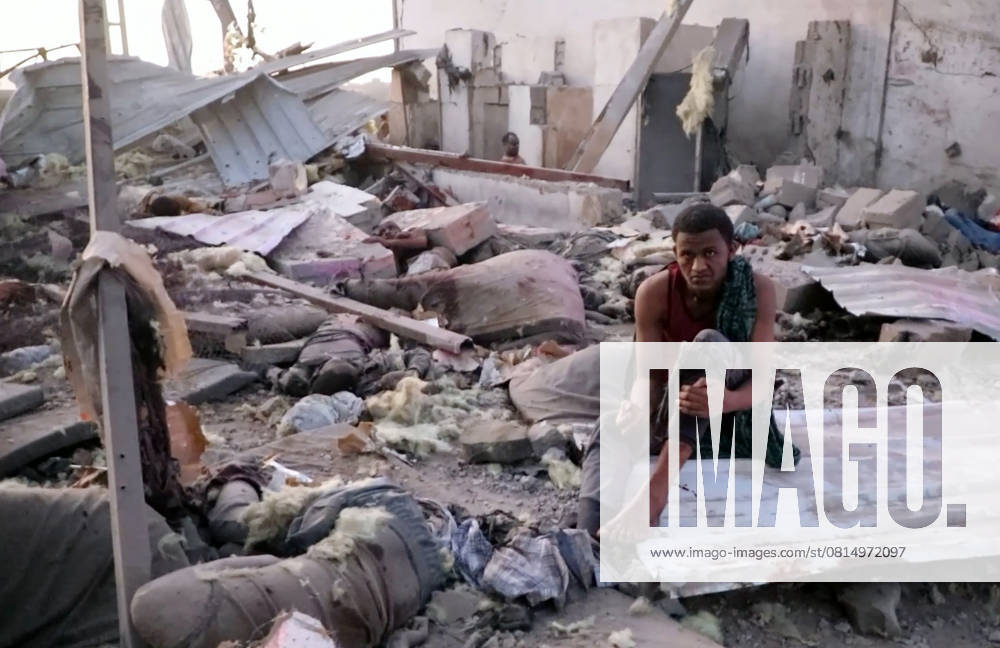 (250428) -- SANAA, April 28, 2025 -- This video screenshot shows an injured man waiting for rescue at a detention center in Saada province, Yemen, April 28, 2025. The death toll from Monday s U.S. airstrikes on a detention center in northern Yemen has risen to 68, with 47 injured, reported the Houthi-run Al-Masirah TV. (Houthi Media Center Handout via Xinhua) (SpotNews)YEMEN-SANAA-U.S. AIR RAIDS-DEATH TOLL Mohammed