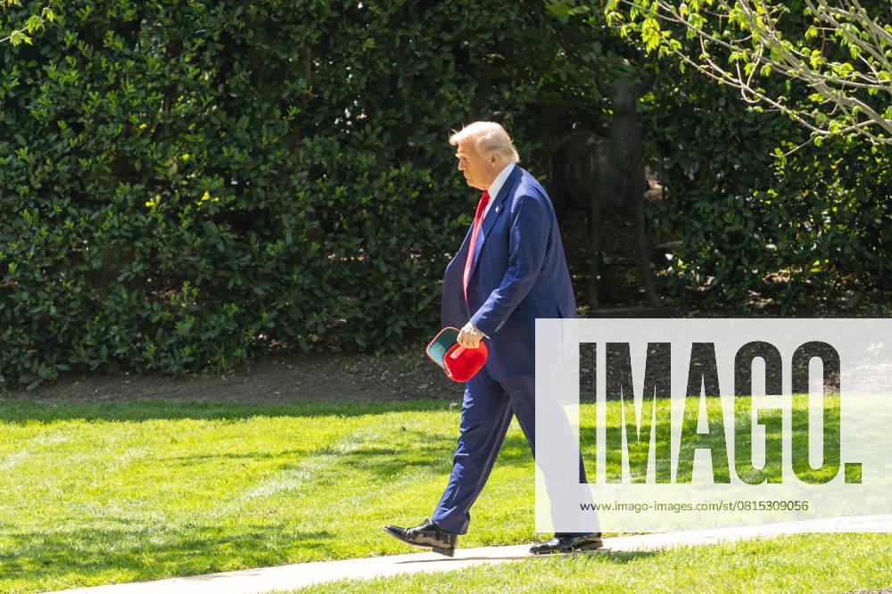 (250429) -- WASHINGTON, April 29, 2025 -- U.S. President Donald Trump walks toward the South Lawn to board Marine One at the White House in Washington, D.C., the United States, on April 29, 2025. The Trump administration has discharged a group of scientists and researchers working on the federal government s evaluation of the impact of climate change, citing the need to re-evaluate its approach to the project, reported The Wall Street Journal on Tuesday. ) U.S.-WASHINGTON, D.C.-WHITE HOUSE-TRUMP HuxYousong