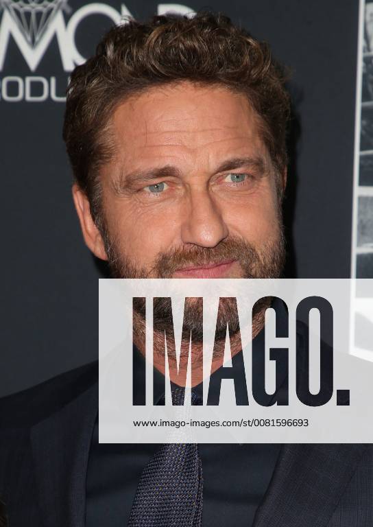 LOS ANGELES, CA - JANUARY 17: Gerard Butler at the premiere of Den Of Thieves at Regal Theaters at LA Live in Los Angeles, California on January 17, 2018.