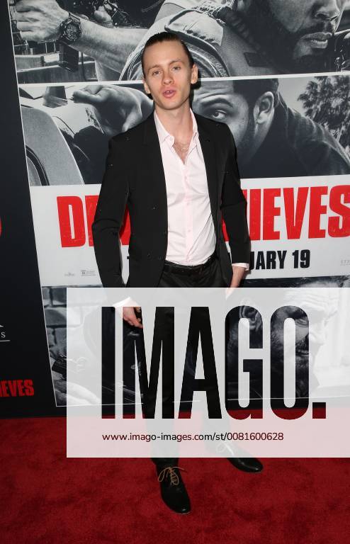 LOS ANGELES, CA - JANUARY 17: Guest, at the premiere of Den Of Thieves at Regal Theaters at LA Live in Los Angeles, California on January 17, 2018.