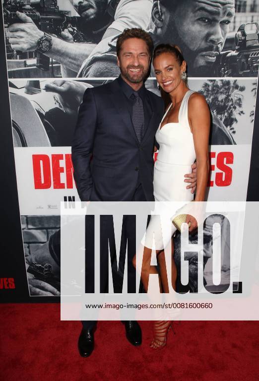 Themen der Woche LOS ANGELES, CA - JANUARY 17: Gerard Butler, Morgan Brown, at the premiere of Den Of Thieves at Regal Theaters at LA Live in Los Angeles, California on January 17, 2018.