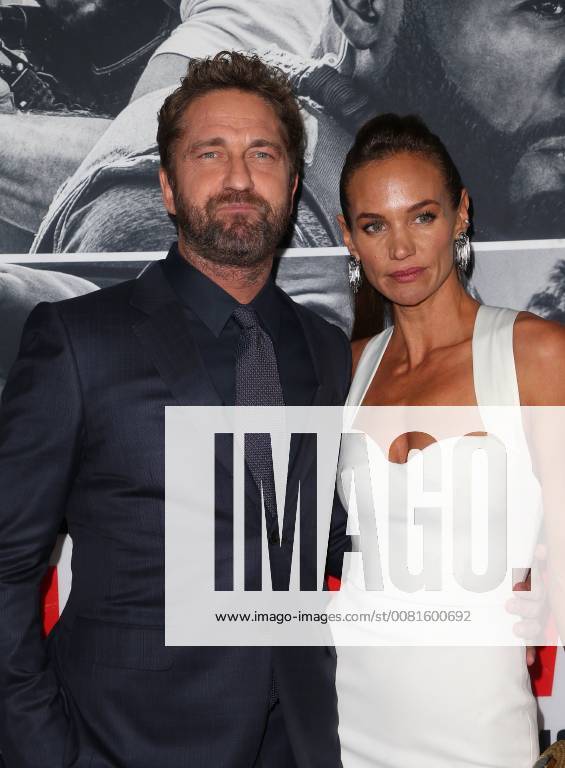 LOS ANGELES, CA - JANUARY 17: Gerard Butler, Morgan Brown, at the premiere of Den Of Thieves at Regal Theaters at LA Live in Los Angeles, California on January 17, 2018.