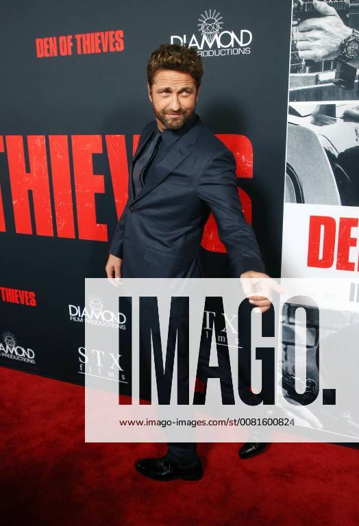 LOS ANGELES, CA - JANUARY 17: Gerard Butler, at the premiere of Den Of Thieves at Regal Theaters at LA Live in Los Angeles, California on January 17, 2018.