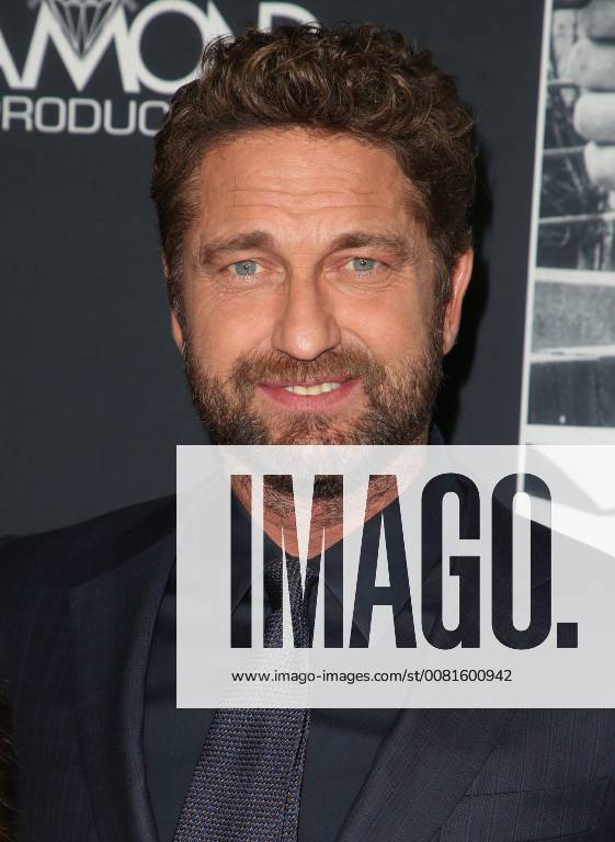 LOS ANGELES, CA - JANUARY 17: Gerard Butler, at the premiere of Den Of Thieves at Regal Theaters at LA Live in Los Angeles, California on January 17, 2018.