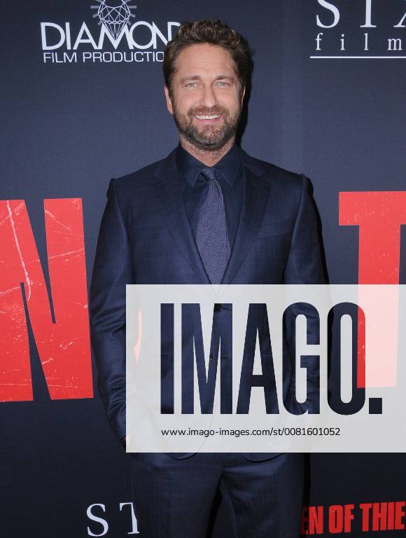 Los Angeles, CA, U.S. - 17 January 2018 - Los Angeles, California - Gerard Butler. Den of Thieves Los Angeles Premiere held at Regal Cinemas LA Live. Photo Credit: Birdie Thompson AdMedia Los Angeles U.S. - ZUMAa123 20180117_zaa_a123_212