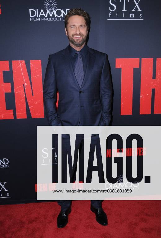 Los Angeles, CA, U.S. - 17 January 2018 - Los Angeles, California - Gerard Butler. Den of Thieves Los Angeles Premiere held at Regal Cinemas LA Live. Photo Credit: Birdie Thompson AdMedia Los Angeles U.S. - ZUMAa123 20180117_zaa_a123_209