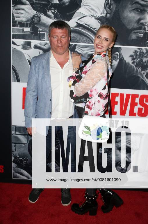 LOS ANGELES, CA - JANUARY 17: Oleg Taktarov, Maria Taktarova, at the premiere of Den Of Thieves at Regal Theaters at LA Live in Los Angeles, California on January 17, 2018.